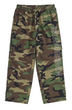 Load image into Gallery viewer, Supreme Spellout Embroidered Ripstop Track Pant &quot;Woodland Camo&quot;
